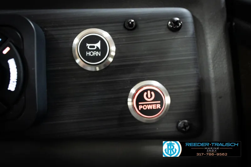 Slide: The Image of Dashboard of 2026 Bennington 21 SSR with horn and power buttons. - 38
