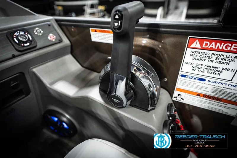 Slide: The Image of Throttle control panel of 2026 Bennington 21 SSR boat with safety warnings. - 39