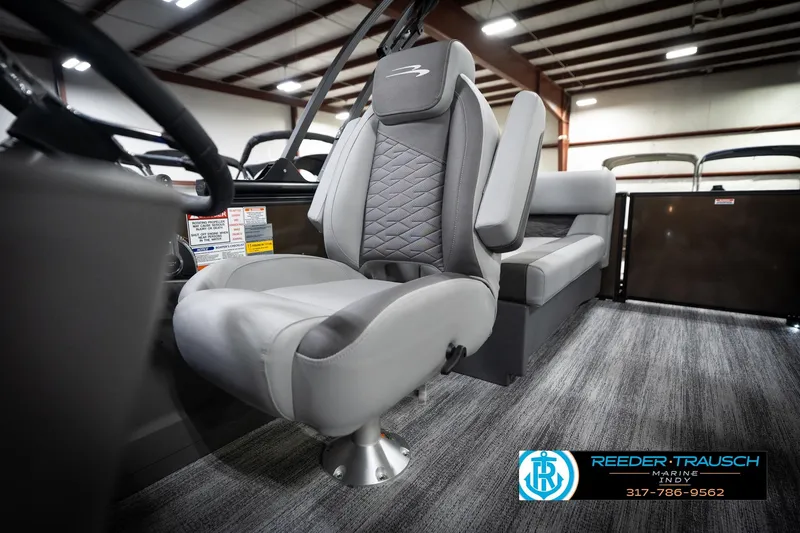 Slide: The Image of 2026 Bennington 21 SSR boat interior with gray seating and modern design. - 40
