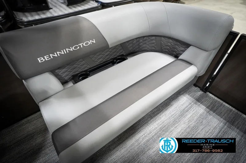 Slide: The Image of 2026 Bennington 21 SSR boat seating with elegant gray upholstery and logo. - 42