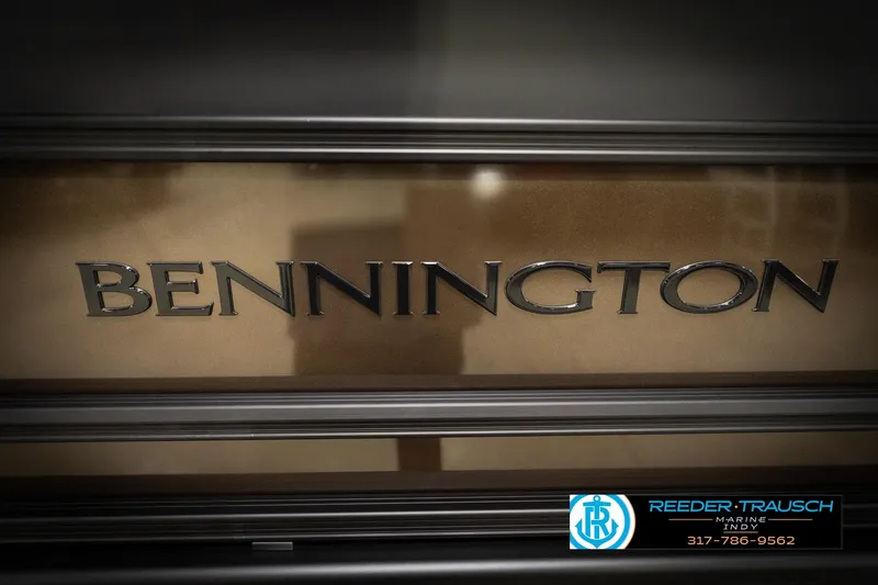 Slide: The Image of Bennington 21 SSR 2026 model logo on a metallic surface, Reeder-Trausch Marine branding. - 47