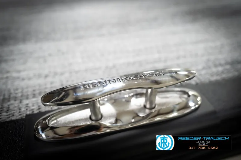 Slide: The Image of Close-up of a Bennington 21 SSR 2026 boat cleat with engraved branding. - 58
