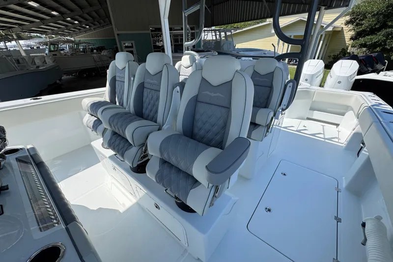 Slide: The Image of Luxurious seating on 2026 Invincible 40 Catamaran, featuring plush, quilted upholstery. - 25