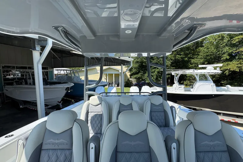 Slide: The Image of 2026 Invincible 40 Catamaran interior with luxurious seating and sleek design. - 27