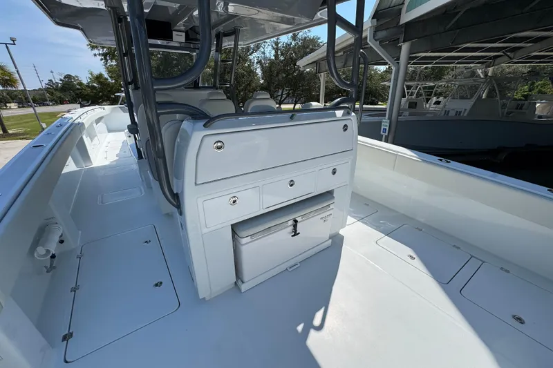 Slide: The Image of 2026 Invincible 40 Catamaran interior with seating and storage compartments. - 32