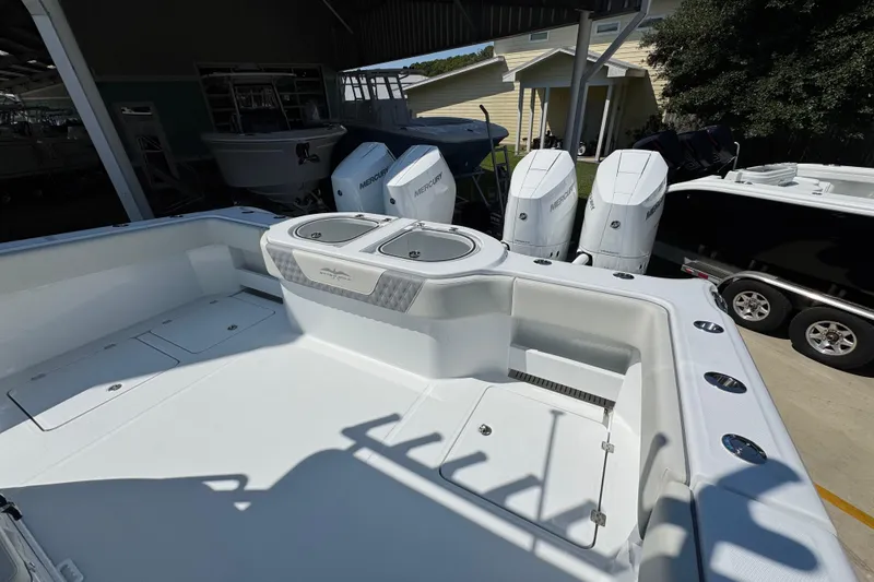Slide: The Image of 2026 Invincible 40 Catamaran with Mercury engines, spacious deck, and modern design. - 35
