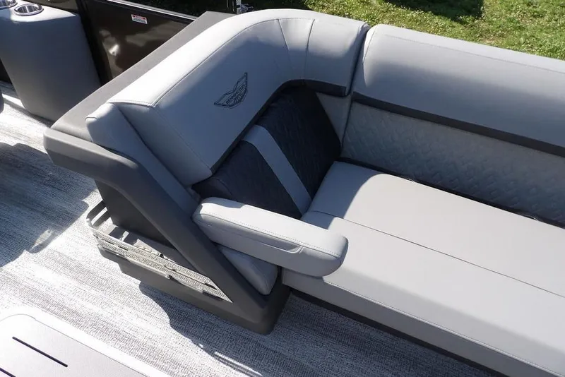 Slide: The Image of Luxurious seating on 2026 Bennington M Swingback 24 MSB pontoon boat, featuring elegant gray upholstery. - 10
