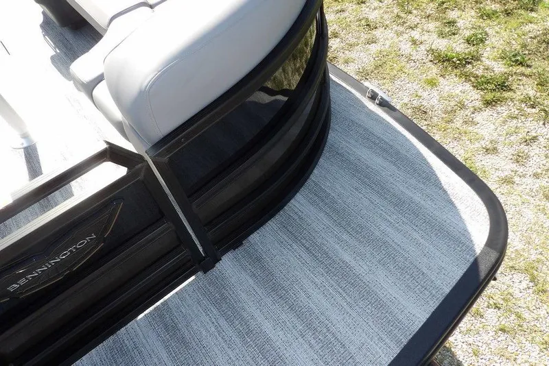 Slide: The Image of 2026 Bennington M Swingback 24 MSB pontoon boat with sleek seating and stylish flooring. - 13