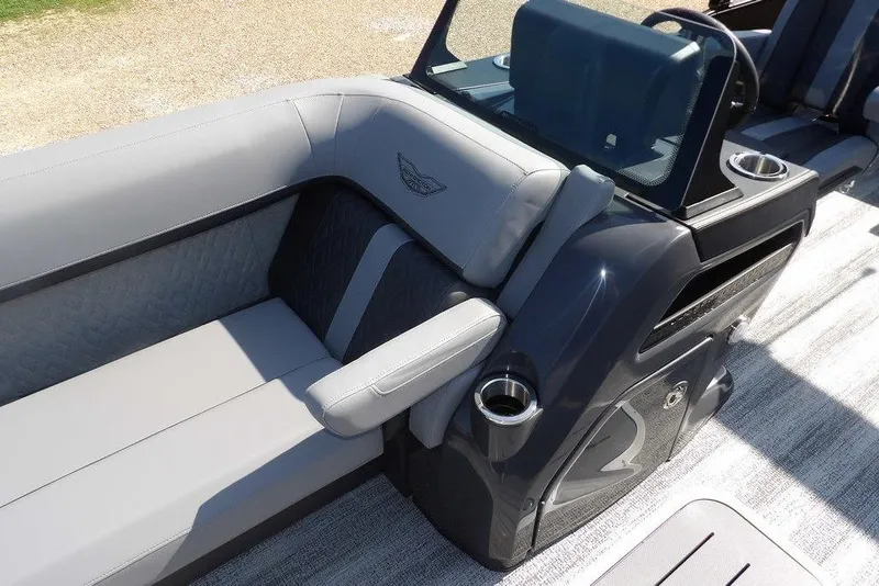 Slide: The Image of 2026 Bennington M Swingback 24 MSB boat interior with luxurious seating and cup holders. - 15