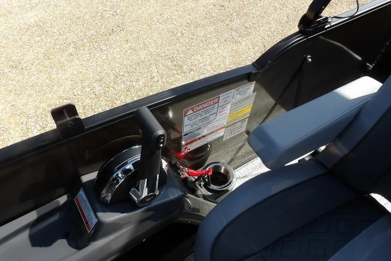 Slide: The Image of Interior of 2026 Bennington M Swingback 24 MSB, featuring control panel and seating. - 28