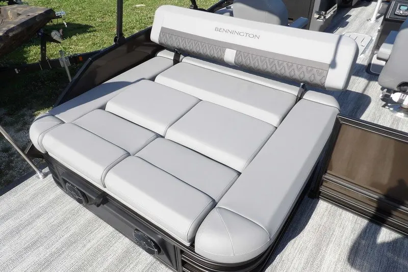 Slide: The Image of 2026 Bennington M Swingback 24 MSB boat with luxurious gray seating. - 29
