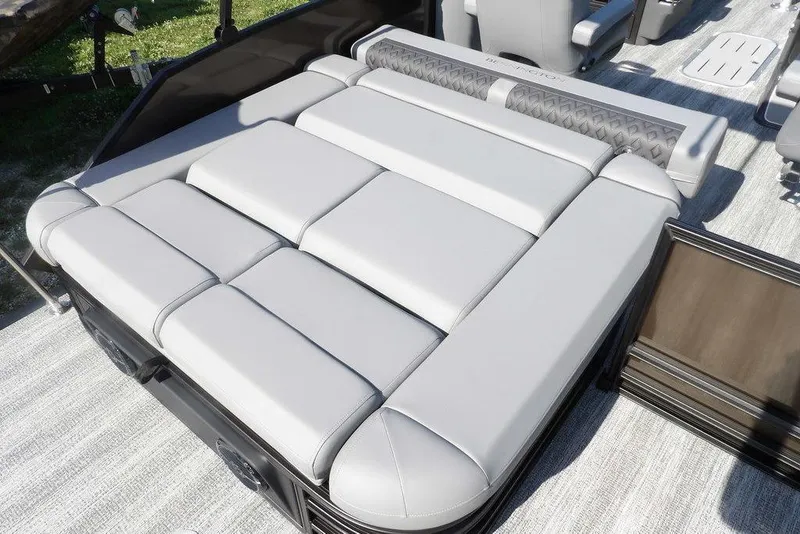 Slide: The Image of 2026 Bennington M Swingback 24 MSB boat with luxurious gray seating. - 32