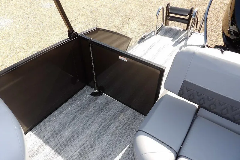 Slide: The Image of 2026 Bennington M Swingback 24 MSB boat interior with seating and ladder. - 33