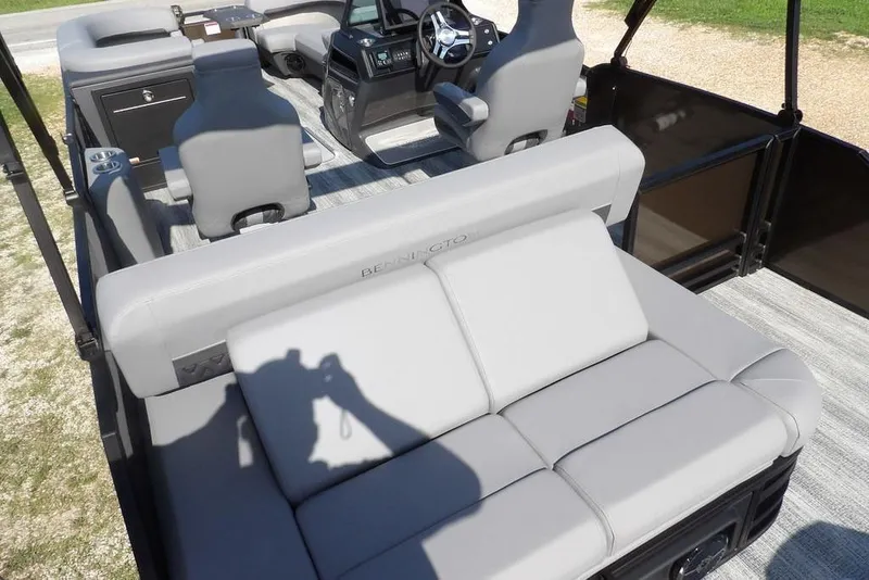 Slide: The Image of 2026 Bennington M Swingback 24 MSB interior with plush seating and modern helm. - 39