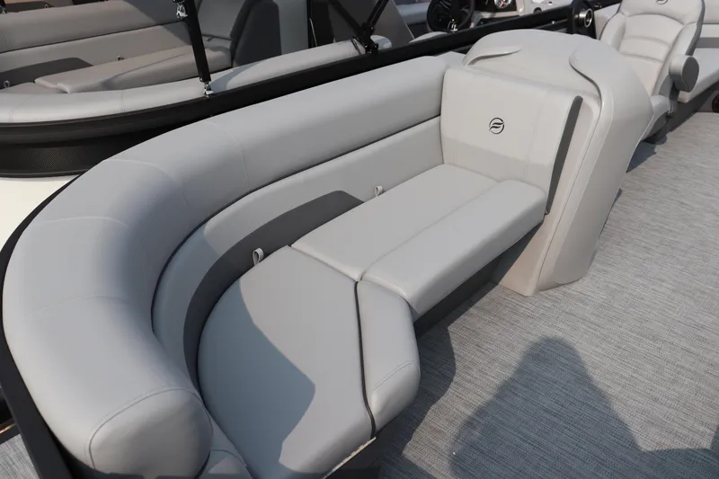 Slide: The Image of Luxurious seating on 2025 Flagship Freedom 22 CU boat, featuring sleek gray upholstery. - 2