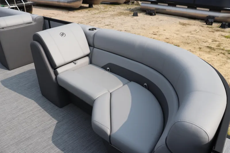 Slide: The Image of Luxurious seating on 2025 Flagship Freedom 22 CU boat, featuring sleek gray upholstery. - 3
