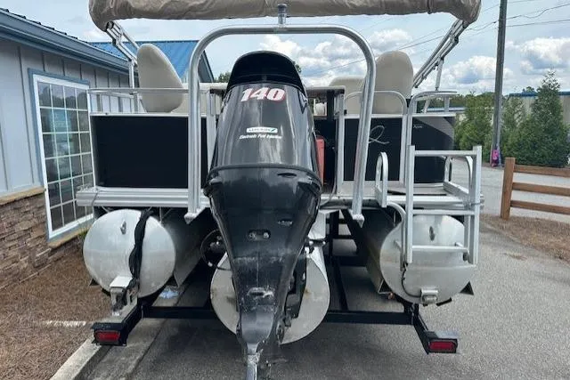 Slide: The Image of 2014 Qwest LS 820 XRE Cruise pontoon boat with powerful outboard motor. - 6