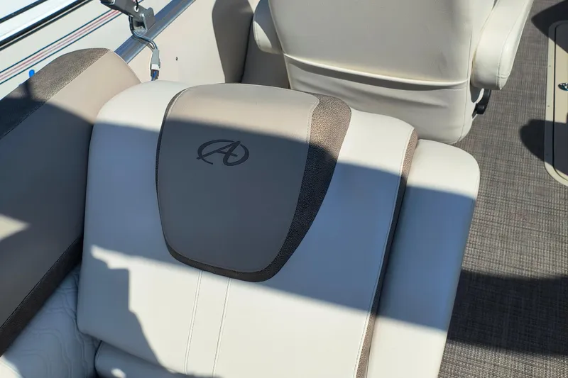 Slide: The Image of 2022 Avalon Catalina Quad Lounge 25 interior seating with logo detail. - 21