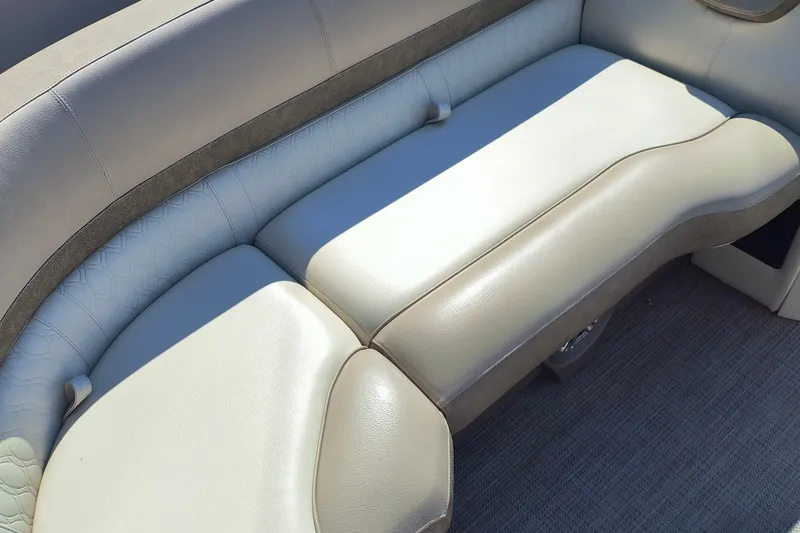 Slide: The Image of 2022 Avalon Catalina Quad Lounge 25 interior seating, featuring luxurious beige upholstery. - 4