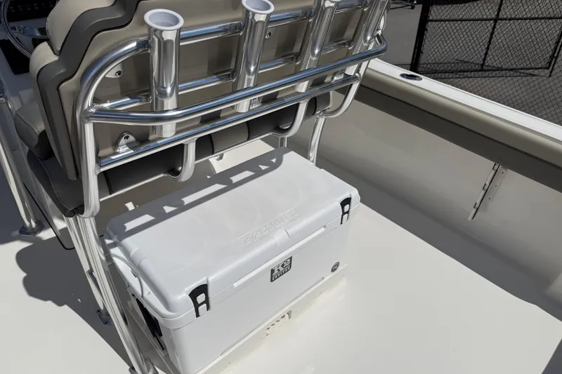 Slide: The Image of 2026 Key West 239 FS boat interior with cooler and rod holders. - 27