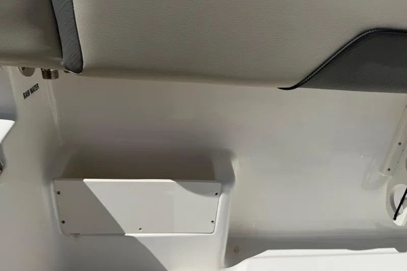 Slide: The Image of Interior detail of 2026 Key West 239 FS boat, featuring seating and storage area. - 39