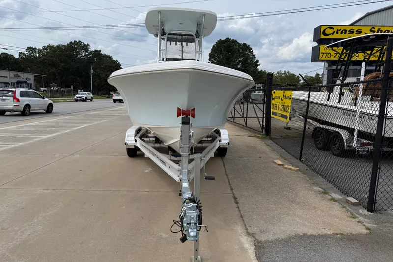 Slide: The Image of 2026 Key West 239 FS boat on trailer at dealership parking lot. - 4