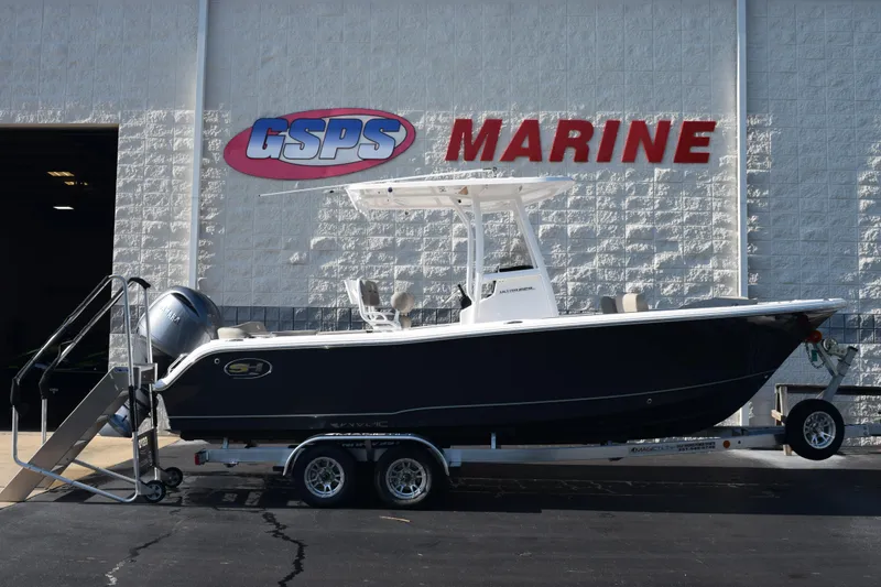 Slide: The Image of 2026 Sea Hunt Ultra 229 boat on trailer at GSPS Marine dealership. - 1