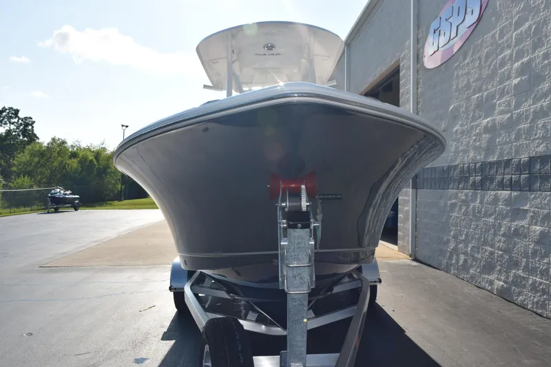 Slide: The Image of 2026 Sea Hunt Ultra 229 boat on trailer outside dealership. - 3