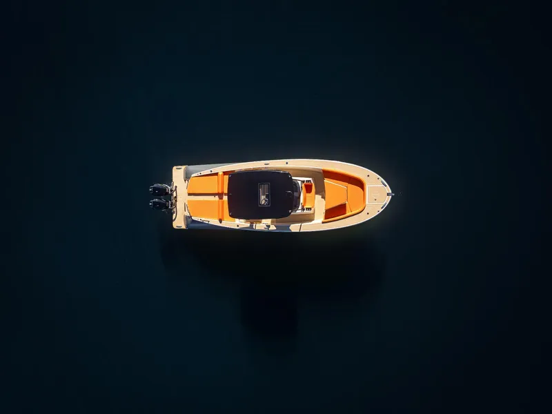 Slide: The Image of Aerial view of 2025 AlCustom LIPARI 31 boat on dark water. - 26