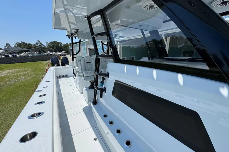 Slide: The Image of 2026 Invincible 46 Catamaran with sleek design and spacious deck layout. - 25