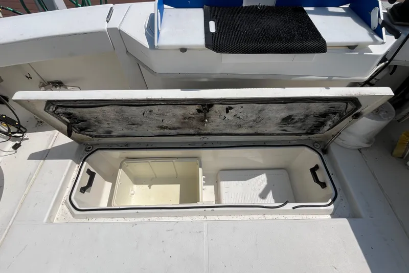 Slide: The Image of Open storage compartment on 2001 Rampage Express 30 Open boat deck. - 17