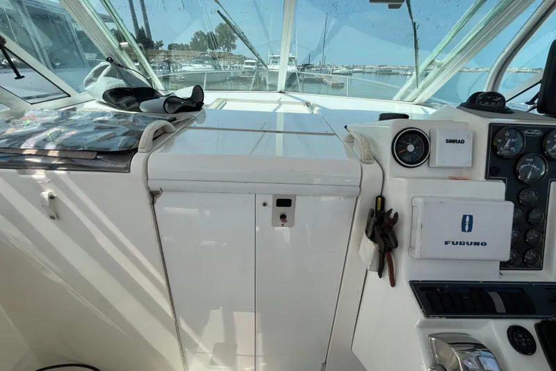 Slide: The Image of 2001 Rampage Express 30 Open boat cockpit with navigation instruments and tools. - 36