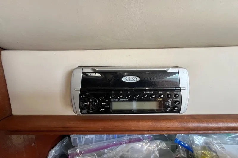 Slide: The Image of Clarion stereo system in 2001 Rampage Express 30 Open boat interior. - 46