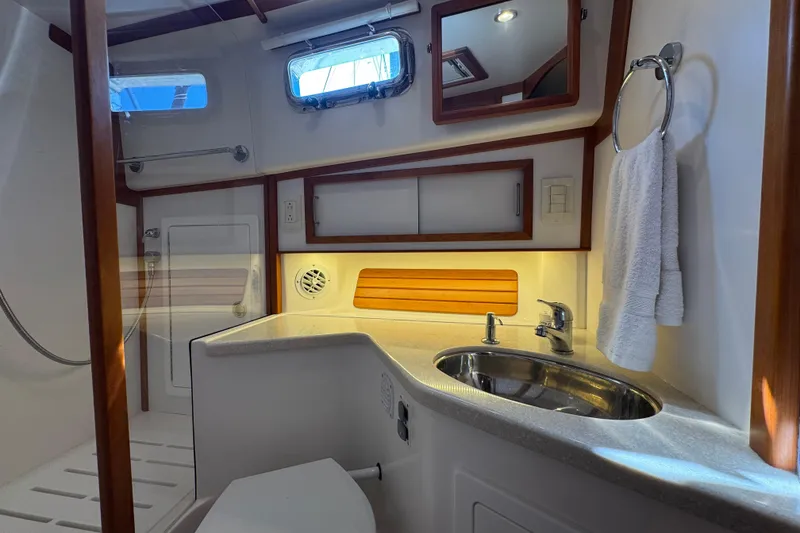 Slide: The Image of 2016 Sabre Craft Salon Express bathroom with sink, mirror, and towel rack. - 18