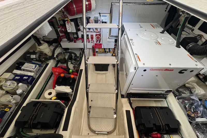 Slide: The Image of Engine room of 2016 Sabre Craft Salon Express with Cummins Onan generator and equipment. - 33