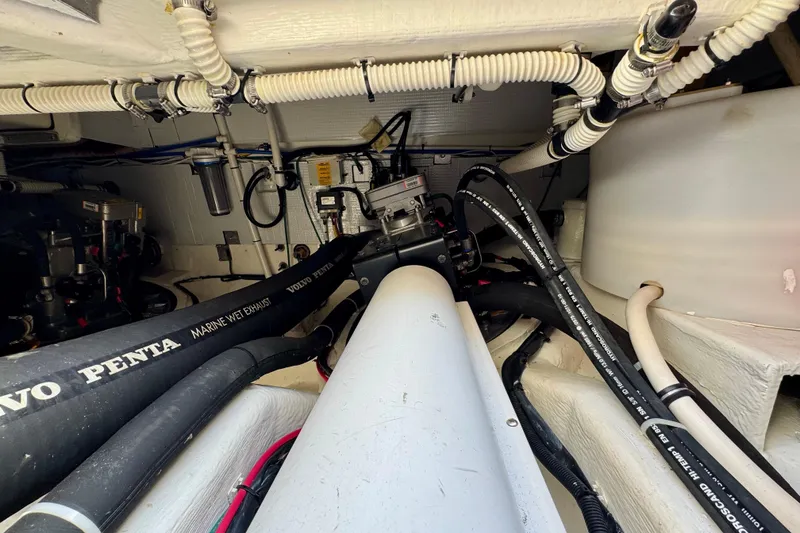 Slide: The Image of Engine room of 2016 Sabre Craft Salon Express with Volvo Penta marine exhaust system. - 38