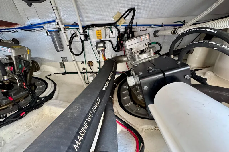 Slide: The Image of Engine room of 2016 Sabre Craft Salon Express with marine wet exhaust system. - 39