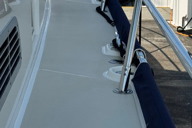 Slide: The Image of 2016 Sabre Craft Salon Express yacht deck with railing and cleats. - 28