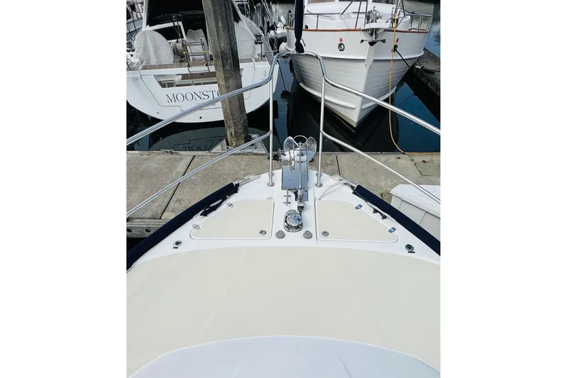 Slide: The Image of 2016 Sabre Craft Salon Express yacht bow view at marina dock. - 29