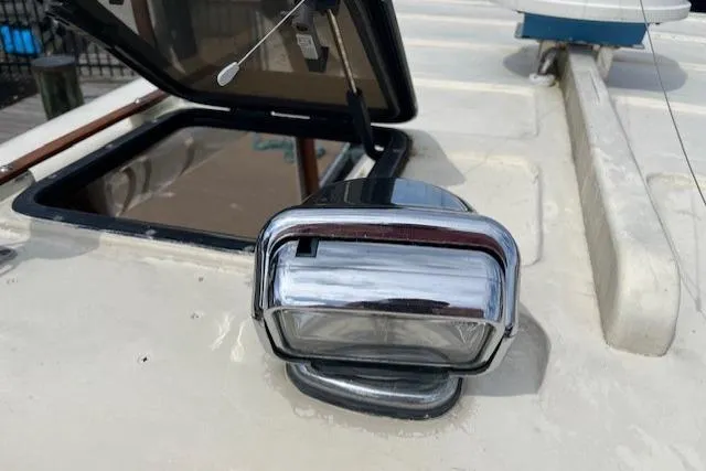 Slide: The Image of 1960 Dyer Hard Top boat with flush deck and open hatch. - 16