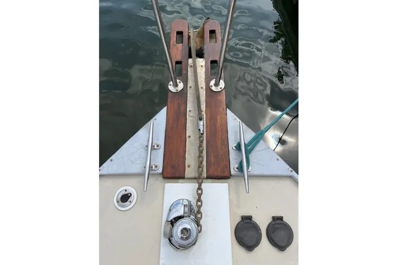 Slide: The Image of Bow of 1960 Dyer Hard Top boat with anchor chain and cleats. - 8
