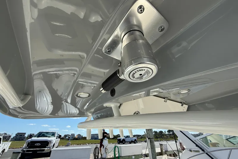Slide: The Image of 2023 Cobia 280 Center Console boat detail with Revolution outrigger mount. - 48