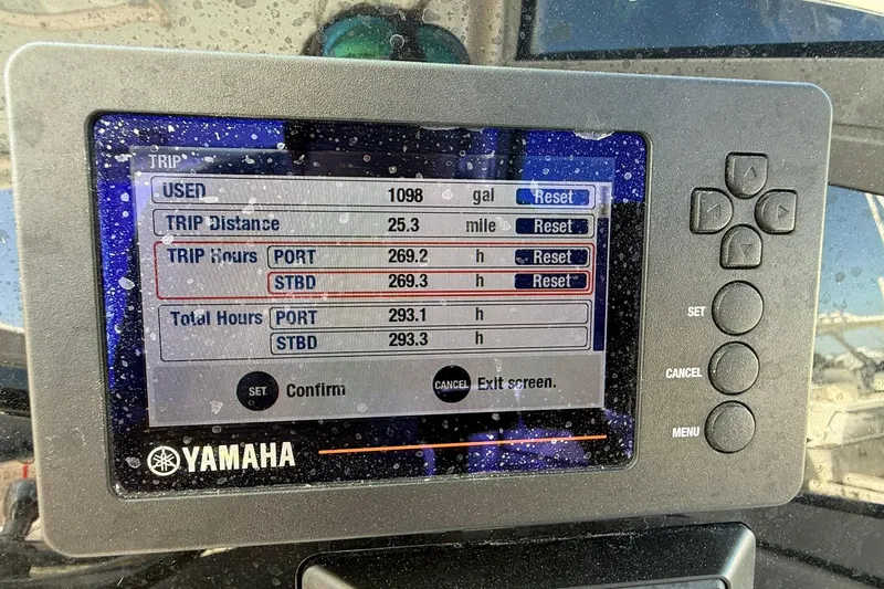 Slide: The Image of Yamaha display on 2023 World Cat 230 DC showing trip data and engine hours. - 4