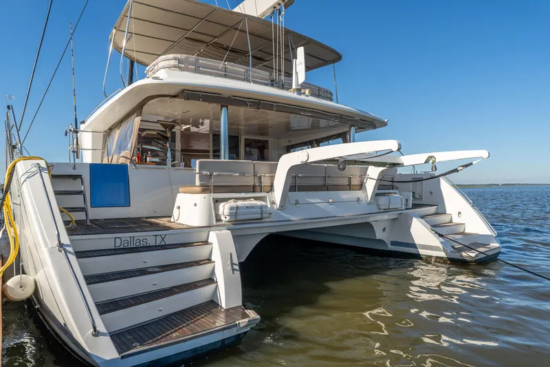 Slide: The Image of Luxury Lagoon 560 catamaran, 2012 model, docked in Dallas, TX, with spacious deck. - 10