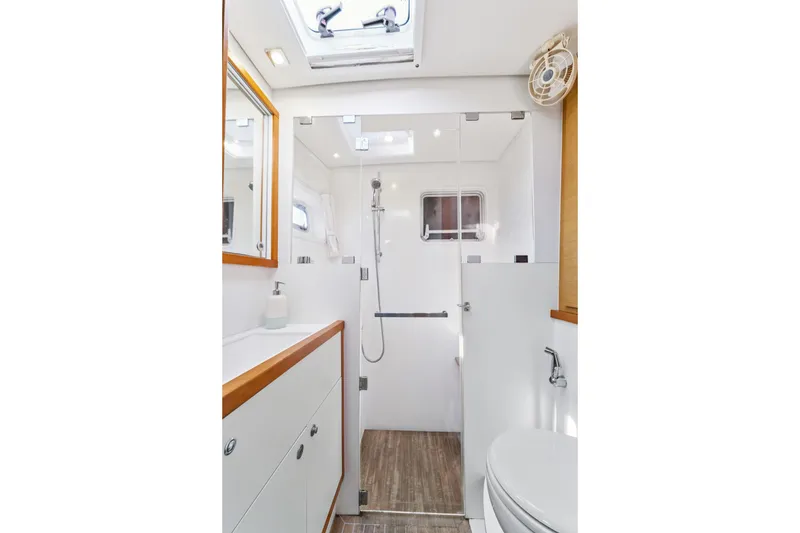 Slide: The Image of Luxurious bathroom in 2012 Lagoon 560 yacht with modern fixtures and elegant design. - 104