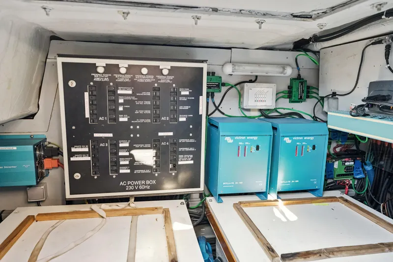 Slide: The Image of Electrical control panel and equipment inside a 2012 Lagoon 560 yacht. - 118