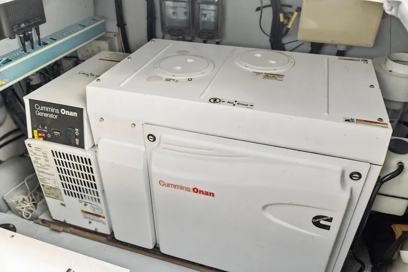 Slide: The Image of Cummins Onan generator in a 2012 Lagoon 560 yacht engine room. - 127