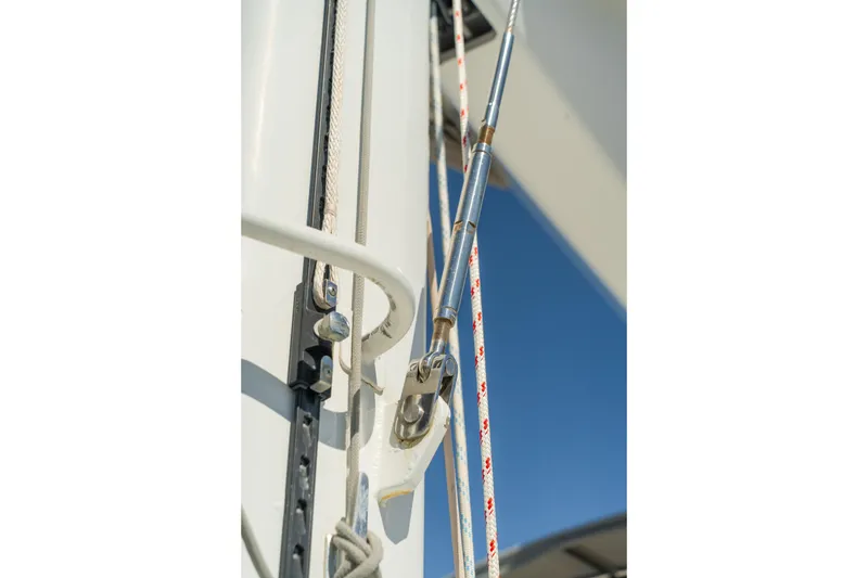 Slide: The Image of Close-up of Lagoon 560 yacht rigging, 2012 model, against clear blue sky. - 16