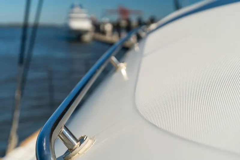 Slide: The Image of Close-up of 2012 Lagoon 560 yacht deck with stainless steel railing. - 27