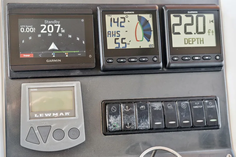 Slide: The Image of Control panel of a 2012 Lagoon 560 yacht with Garmin displays and Lewmar controls. - 36